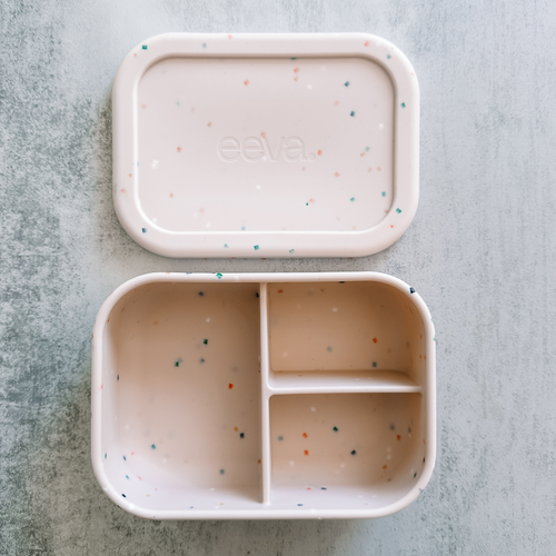 eeva Trio Bento silicone bento lunch box with 3 compartments in Confetti Blush speckle, lid off.